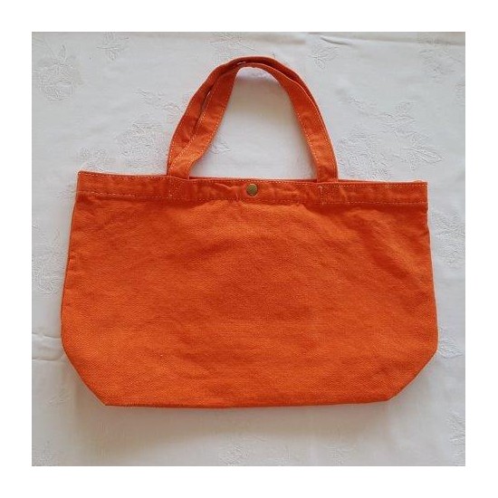 Petit sac orange brodé