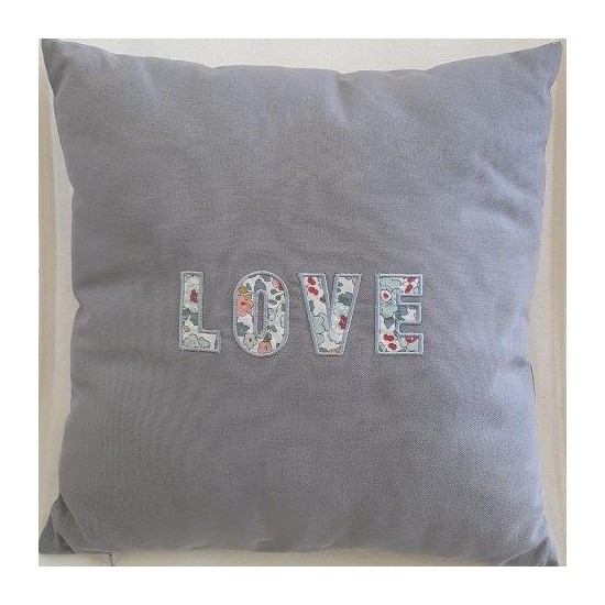 Coussin carré motif appliqué